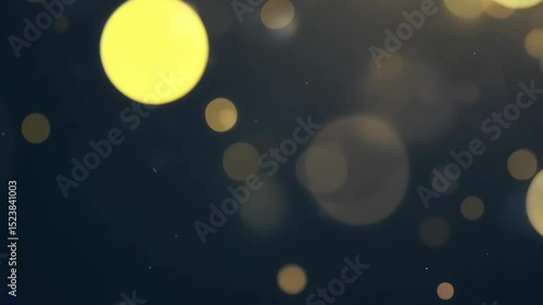 Ethereal floating light orbs against dark backdrop create mesmerizing abstract motion