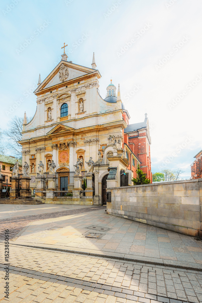Fototapeta premium Main street Rynek Głowny in Krakow with square and church St. Mary's Basilica in Poland