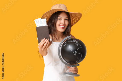 Young Asian woman with glob...