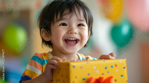 Happy Child Holding Birthday Gift