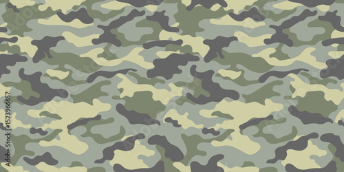 Green camouflage pattern for clothing design. Trendy military pattern