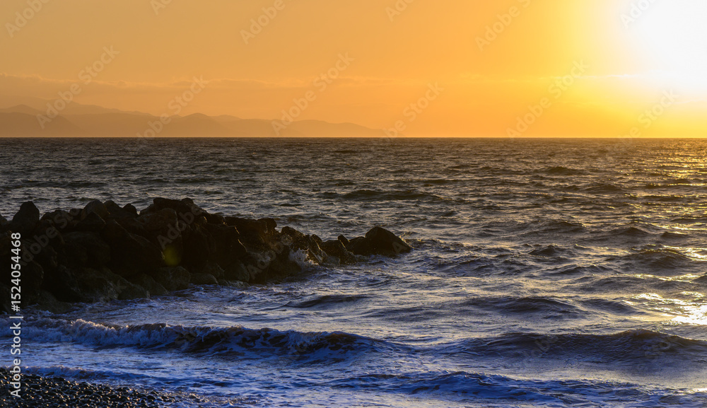 Obraz premium Tranquil view of the Mediterranean Sea at dusk in Cyprus