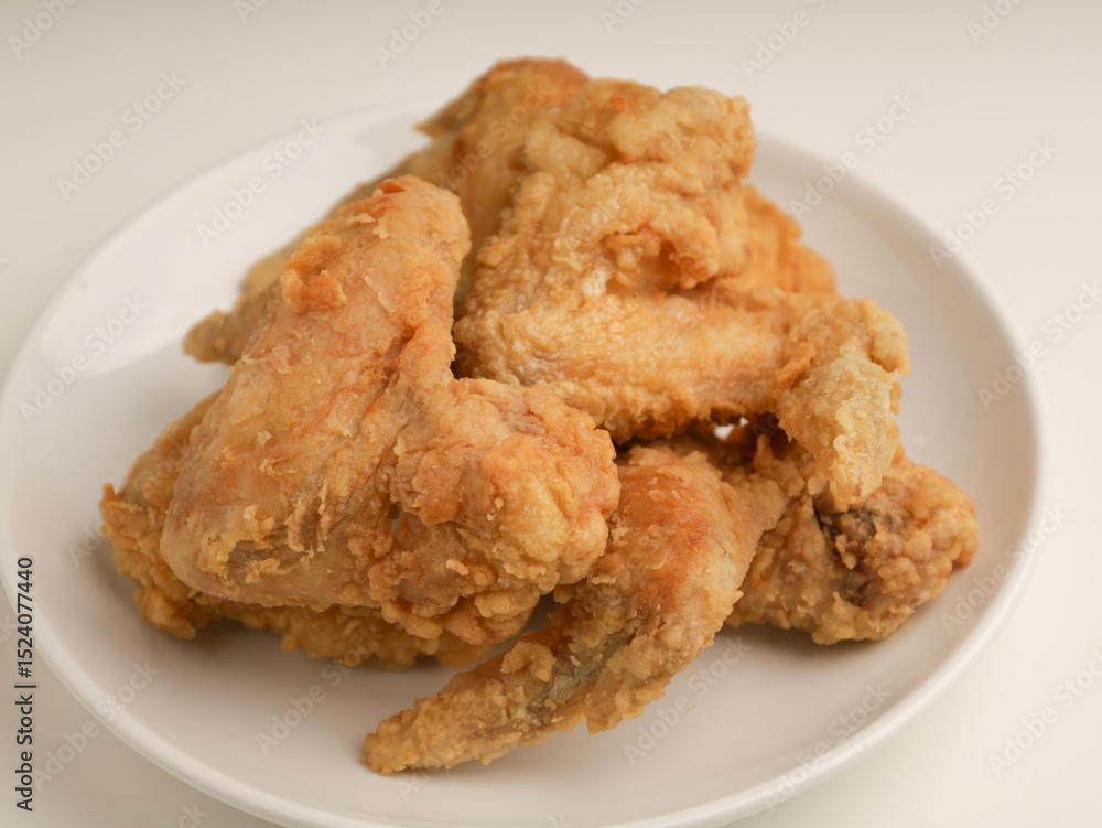 Piled of fried chicken on white background Piled of fried chicken on white background