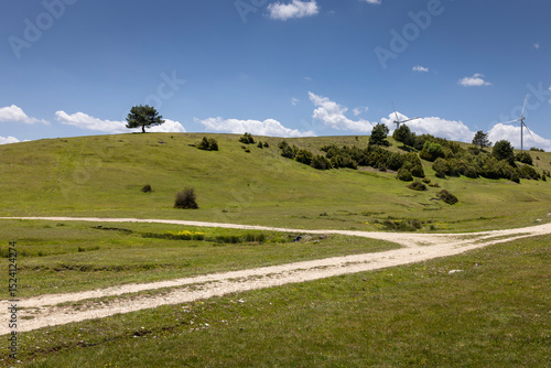 Wind renewable energy. Windmills in the highlands. Production of electric energy