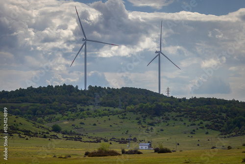 Wind renewable energy. Windmills in the highlands. Production of electric energy