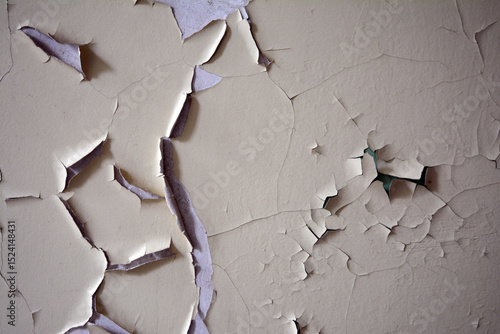 Texture: Old wall, light yellow, with cracked paint.