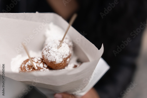 Traditional Belgian Smoutebollen Served in Paper Cone