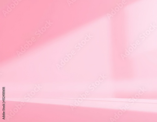 Soft Pink Studio Backdrop with Gentle Light and Shadow Play for Product Displays