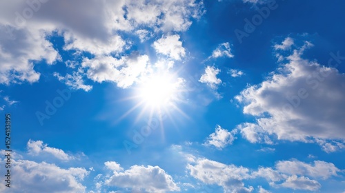 Vibrant High Noon Sunlight Blue Cloudy Sky Background – Blinding Sun Rays, Cerulean Skies, Luminous Cloud Textures, Energetic Midday Atmosphere