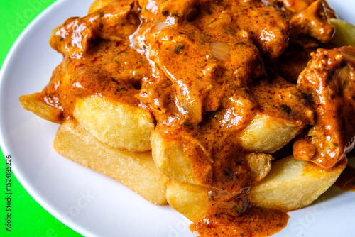 Plate Of British Favourite Chicken Curry And Chips