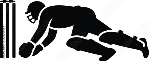 A black silhouette of a cricket wicket keeper diving towards the stumps in a dynamic pose image