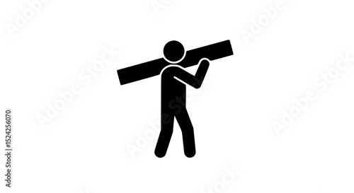 A man is carrying a large piece of wood