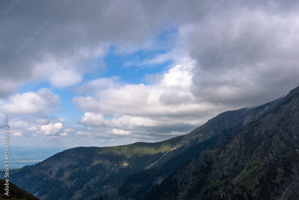 Fototapeta premium mountain ladder landscape with clouds in summer carpathians romania