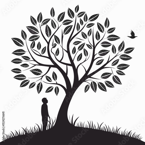 Silhouetted man contemplating nature underneath a tree