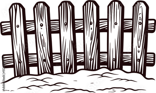 Wooden fence with snow covered ground in winter scene