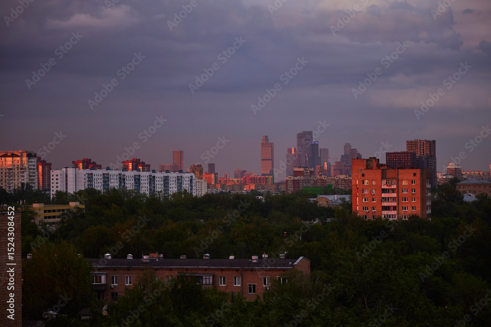 Fototapeta premium Bright sunset sky before a storm over the city of Moscow, Russia