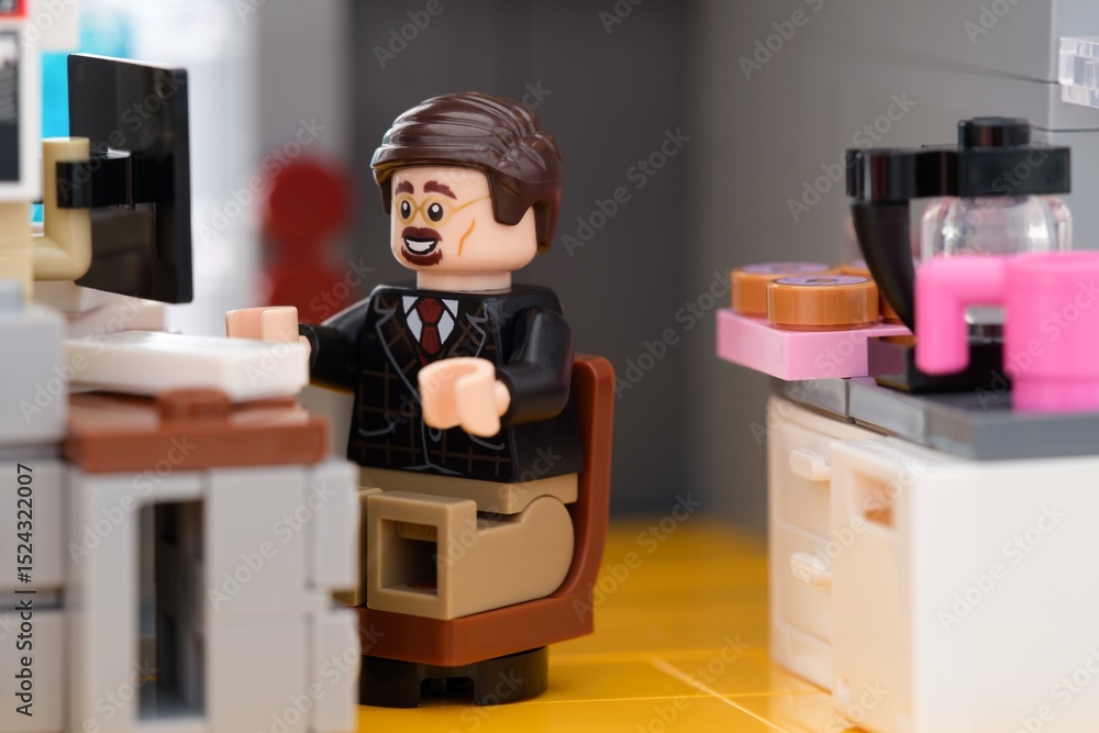Obraz premium Tambov, Russian Federation - January 06, 2025 Lego office worker minifigure working in an office.