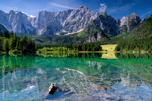 Tableau sur toile Beautiful Lake Fusine Superiore and mount Mangart, Julian Alps, Tarvisio, Udine province, Friuli Venezia Giulia, Italy