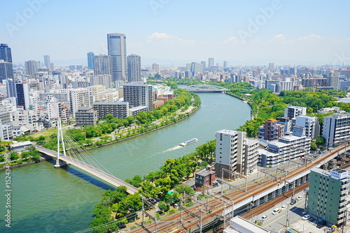 Osaka skyline along with Neya river (Neyagawa) in Japan - 日本 大阪府 寝屋川 大阪のビル 水上バス
