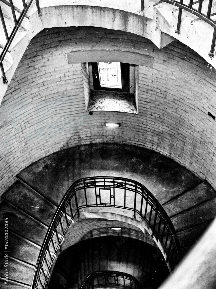 Fototapeta premium Spiral of Time Helical Staircase in an Old Building