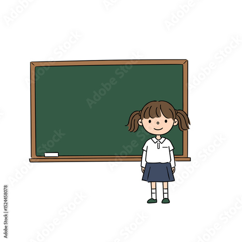 Smiling schoolgirl standing in front of a chalkboard ready to present