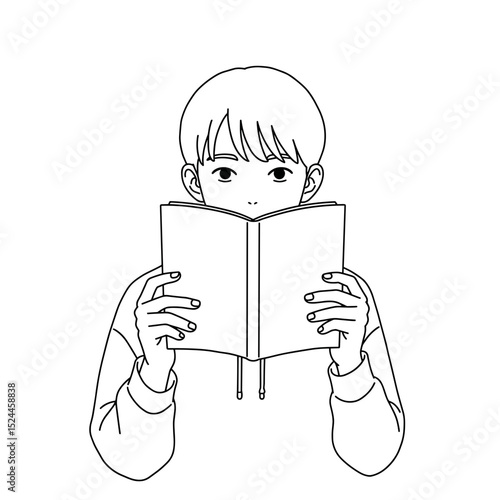 Focused schoolboy reading book with curiosity and interest