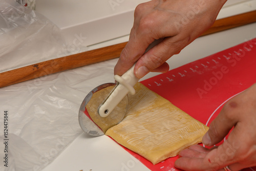 Принти на полотні Preparing Dough for Homemade Parker House Buns