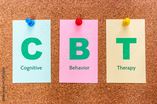 Conceptual 3 letters keyword CBT (Cognitive Behavioral Therapy), on multicolored cards attached to a cork board.