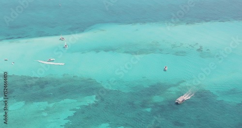 Boats sailing the turquoise waters of the Mexican Caribbean, Cancun, Riviera