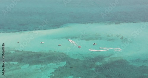 Boats sailing the turquoise waters of the Mexican Caribbean, Cancun, Riviera