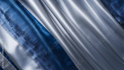 Flowing Fabric: Silver and Deep Blue Silk Abstract Motion Background
