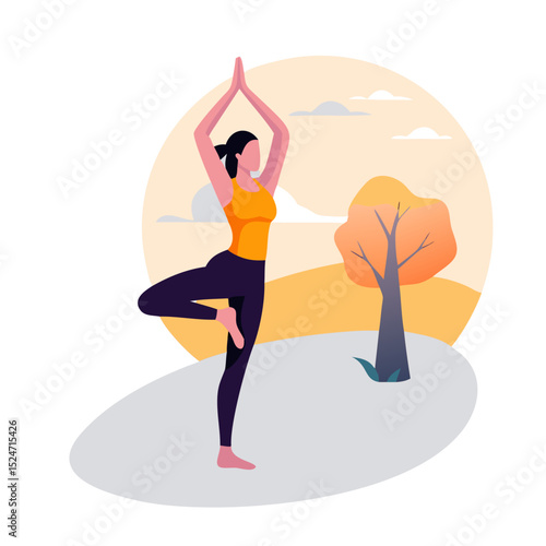 Woman practicing yoga tree pose outdoors in autumn