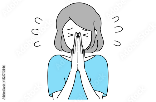 手を合わせて申し訳なさそうに頭を下げている若い女性