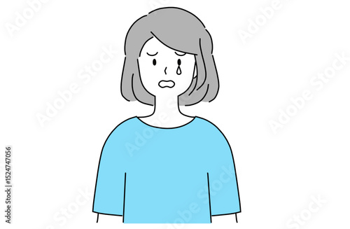 涙を流しながら悲しそうな表情をする若い女性