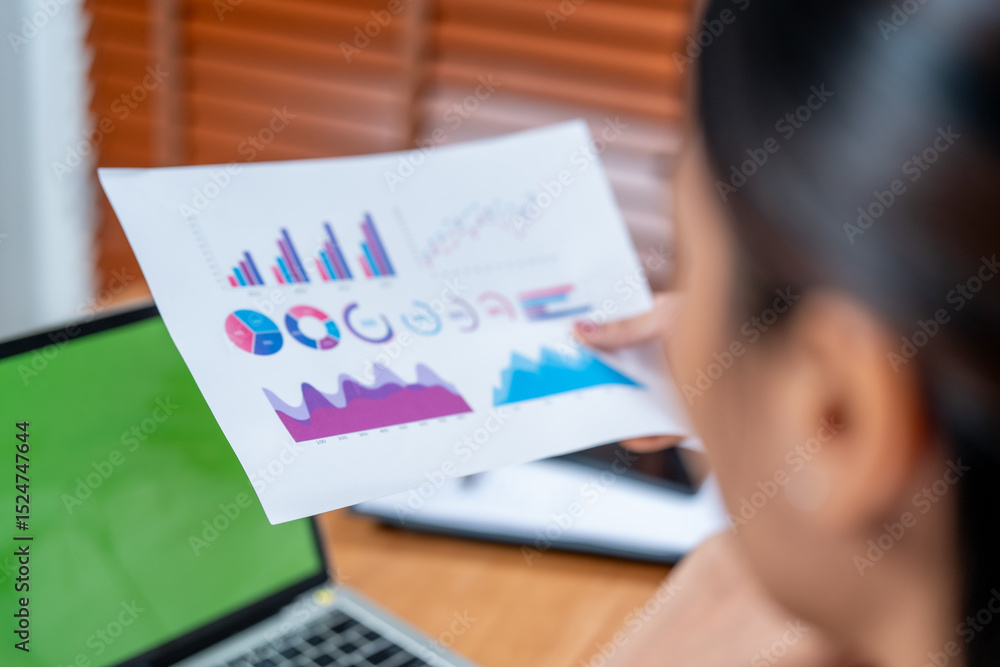 Analyzing cosmetic marketing data requires careful planning and effective packaging to convey insights clearly. This captures focused individual reviewing charts and graphs paper, emphasizing Analyzing cosmetic marketing data requires careful planning and effective packaging to convey insights clearly. This captures focused individual reviewing charts and graphs paper, emphasizing