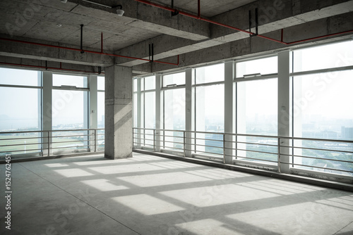 empty pure commercial office building undecorated in gray colors.open space office