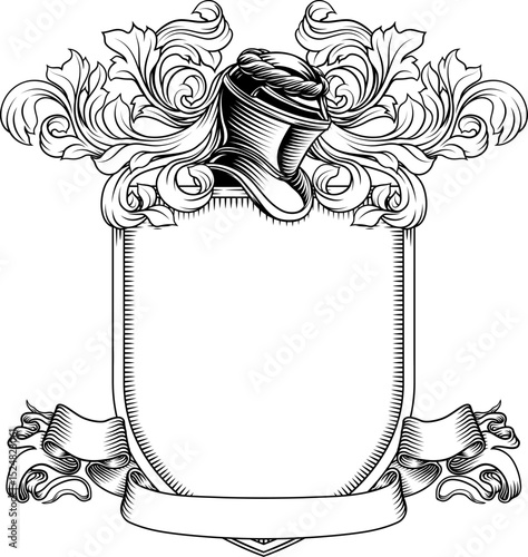Coat of arms crest knight family medieval shield heraldry heraldic armorial motif. Featuring a knights helm helmet in a vintage etching engraving woodcut style