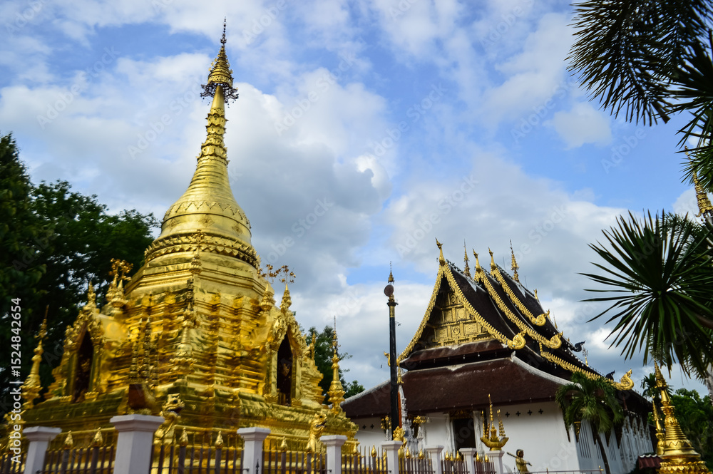Fototapeta premium Pagoda and Chapel, Lanna Architecture, Symbols of Buddhism, South East Asia at wat Sri Mung Mueang, Doi saket, Chiang Mai, Northern Thailand