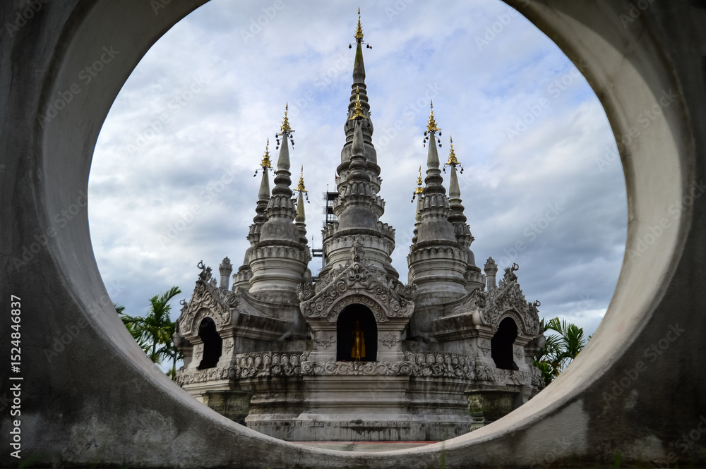 Fototapeta premium Pagoda in evening, Lanna Architecture, Symbols of Buddhism, South East Asia at Phra That Wisutthiyan Temple (Trailaksanaram Forest Temple) Doi saket, Chiang Mai, Northern Thailand