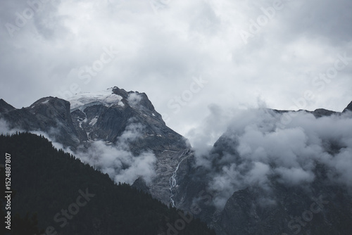 Snowcapped mountains on a cloudy day