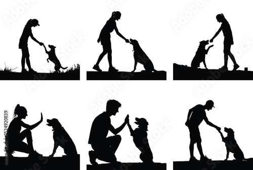 Silhouette of Young Girl and Dog Sharing a Handshake in a Friendly Moment. Pet Lover boy Shaking Hands with Her Loyal Dog.