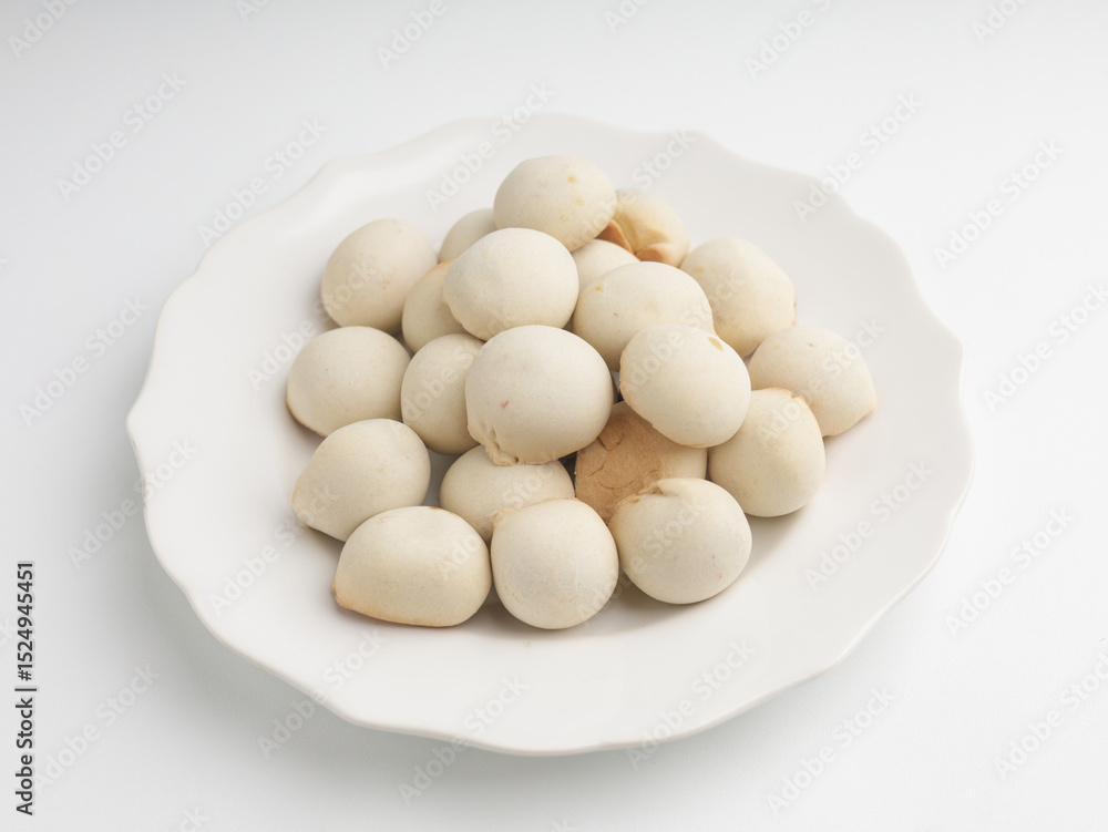 Pastry ball with chocolate filling on white background Pastry ball with chocolate filling on white background