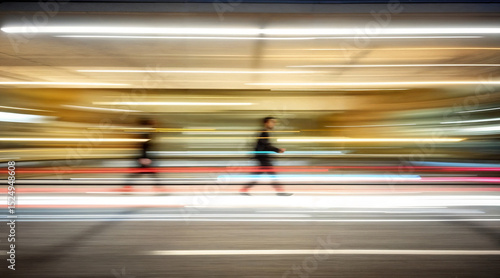 Motion blur of a person walking in a dynamic urban environment with light trails