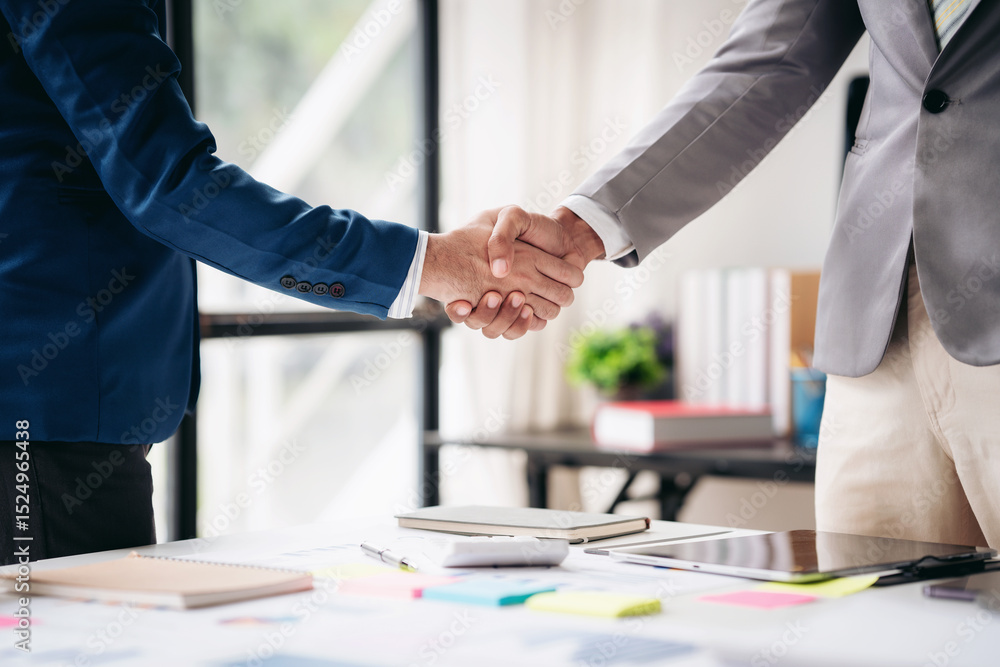 custom made wallpaper toronto digitalTwo men shake hands in a business meeting