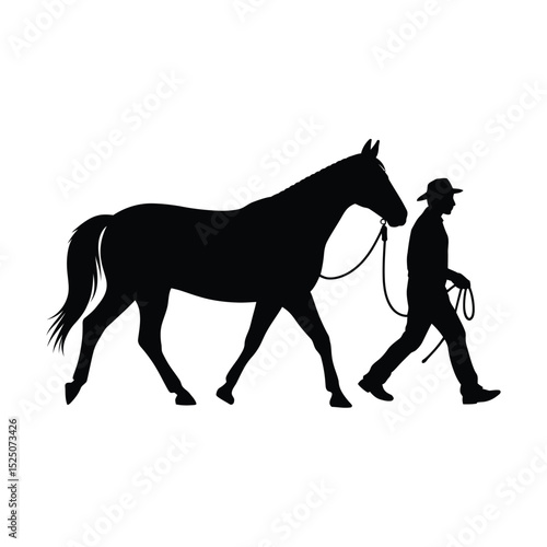 Silhouette of a Cowboy Leading a Horse