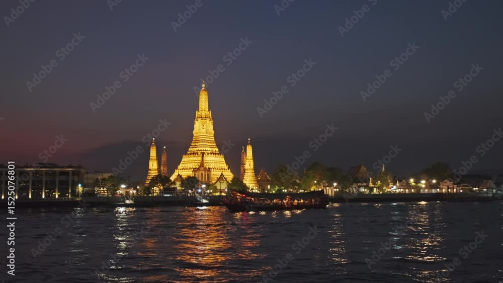 Wat Arun illuminated temple and sunset over Chao Phraya river in Bangkok, vibrant colors in the sky, time lapse, 4k Wat Arun illuminated temple and sunset over Chao Phraya river in Bangkok, vibrant colors in the sky, time lapse, 4k