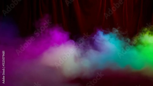A captivating display of colorful smoke envelops the stage, enhancing the atmosphere during a lively celebration in the bustling city center