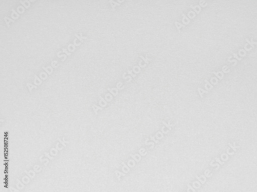 Papier peint Subtle textured white paper with a soft, grainy surface for a delicate backdrop