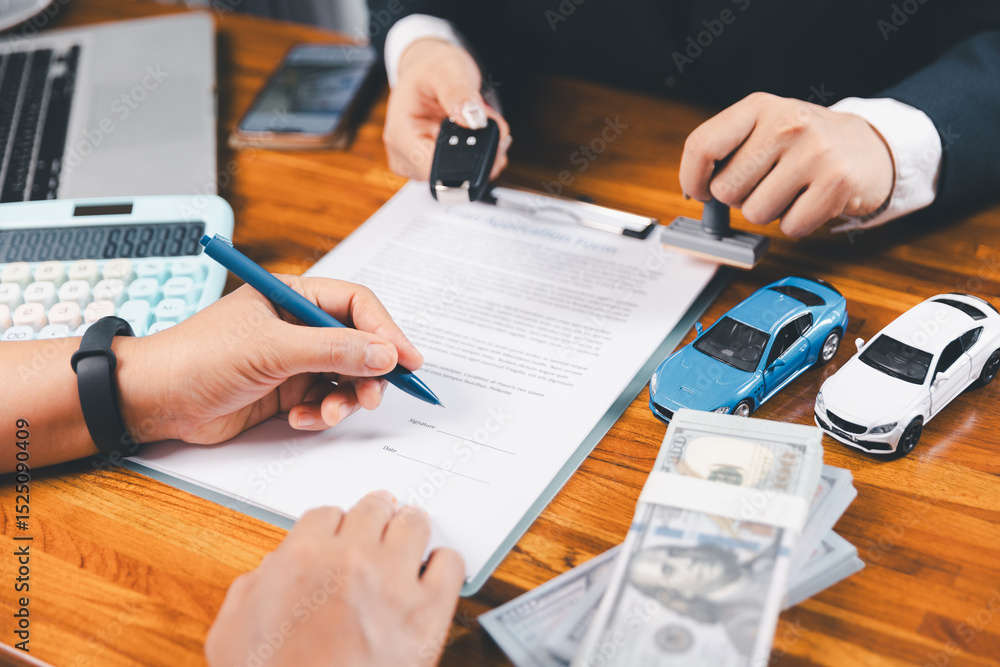 ฺBusinessman approval stamper stamp on paper business contract. car loan money approved. Dealer or manager gives car to customer sign car purchase document with insurance, contract to buy car legal. ฺBusinessman approval stamper stamp on paper business contract. car loan money approved. Dealer or manager gives car to customer sign car purchase document with insurance, contract to buy car legal.