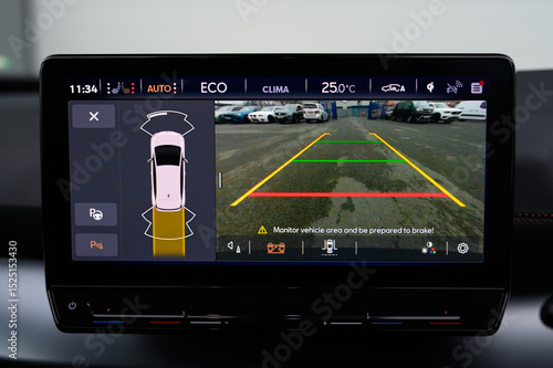 Car Dashboard Display with Reverse Camera and Sensor Indicators